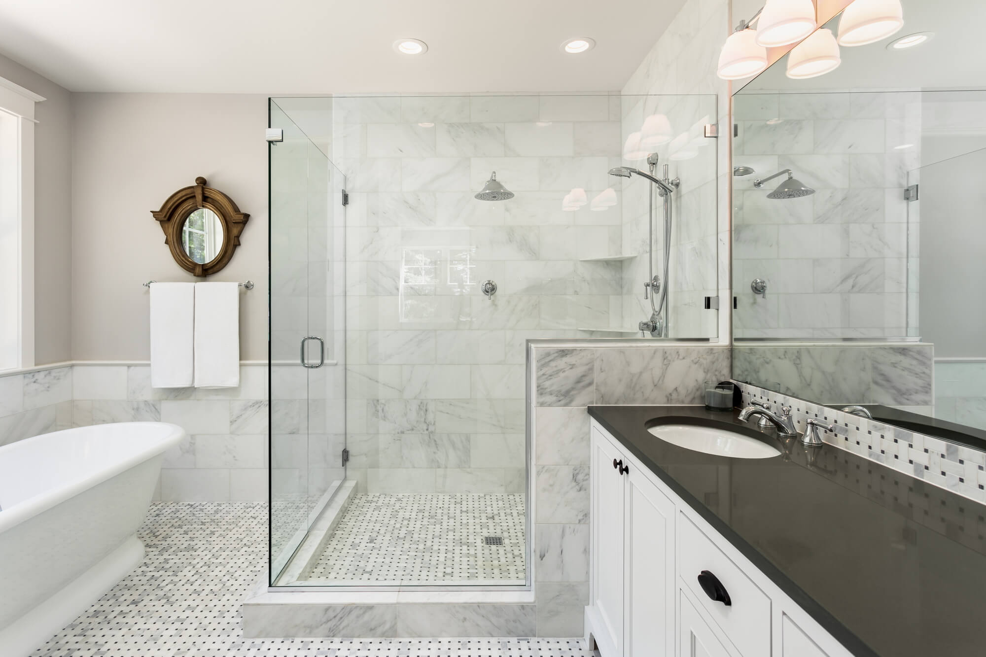 bathroom with white tile floors