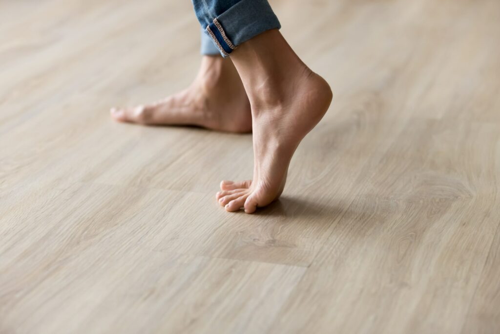 Feet Walking on Wood Floors