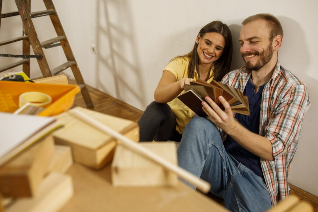 couple looking at floor samples