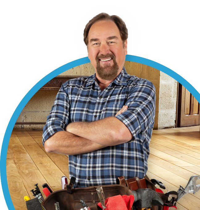 Richard Karn wearing tool belt