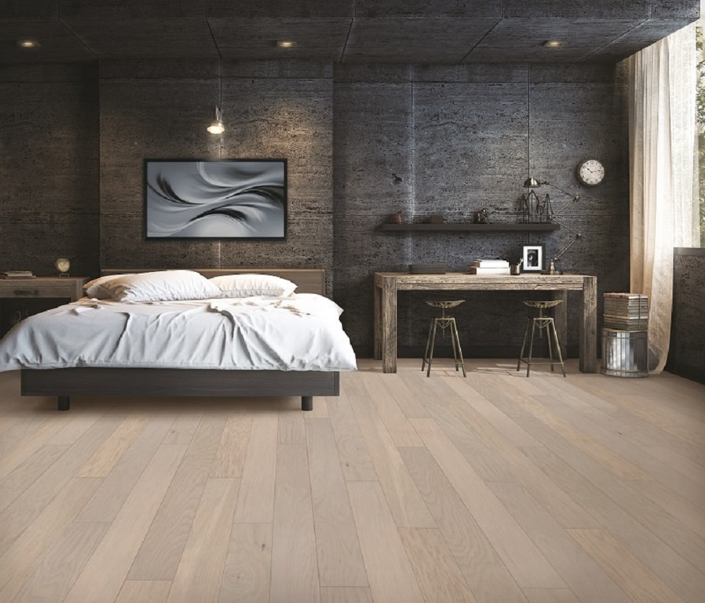 dark bedroom with wood floors