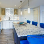 kitchen with white cabinets and light vinyl floors