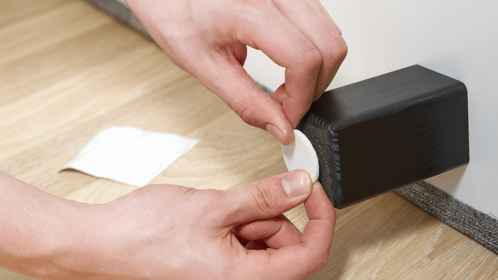 Man are sticking floor care pad